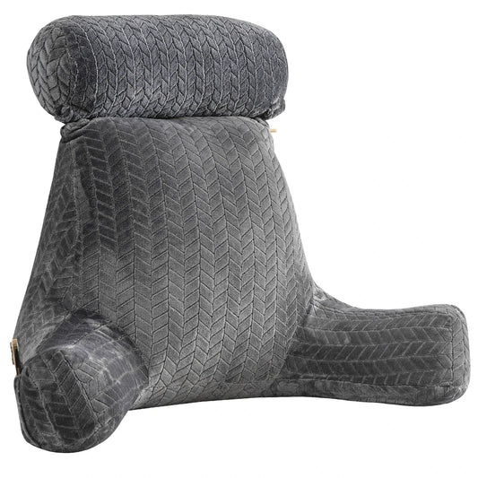 gros plan sur un coussin de lecture gris avec accoudoirs et rouleau pour la nuque
