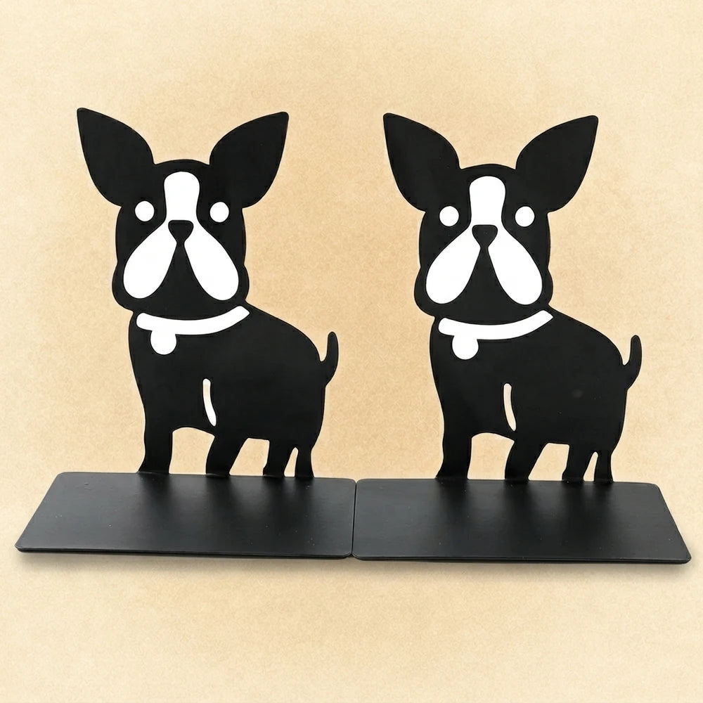 Paire de supports à livres noirs en forme de chiens sur fond blanc