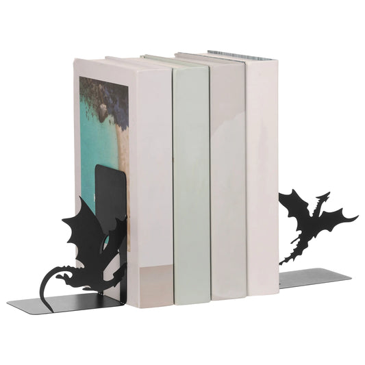 Deux silhouettes de dragons noires encadrant quatre livres clairs