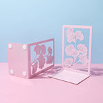Serre-livres fleurs roses - Vignette | Le coin du lecteur