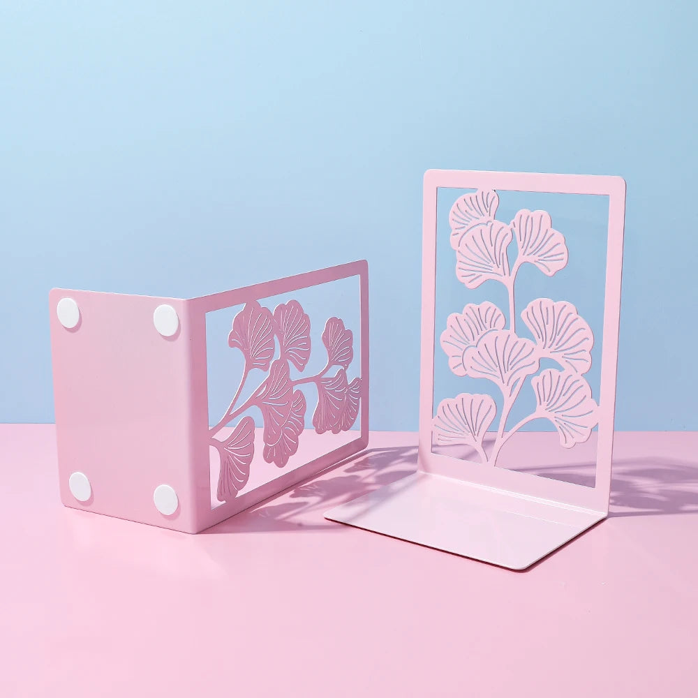 Vue avant et dessous des supports roses avec bases plates et patins ronds